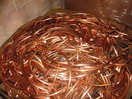 Bin of bright copper wire and tubing.
